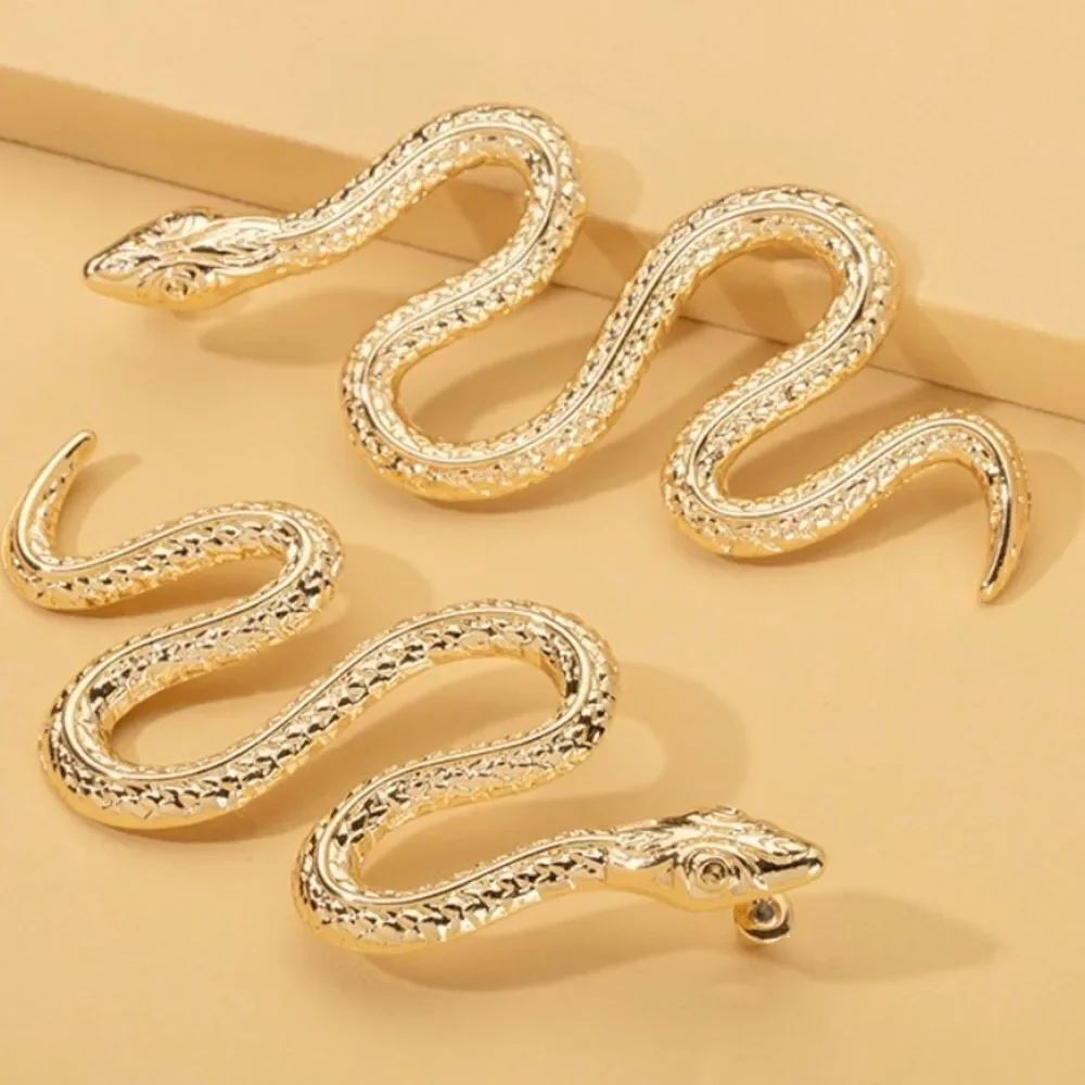 🐍 New diamond cut sparkling rose goldtone snake earrings 🐍